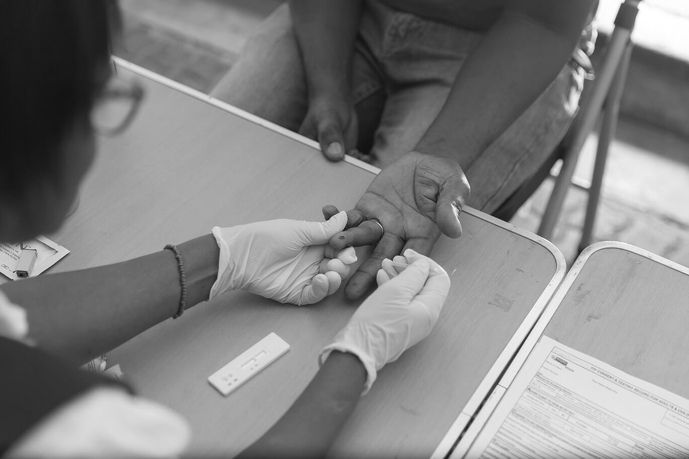 HIV test finger prick